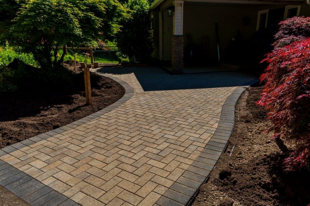 Custom built brick drive to compliment landscaping