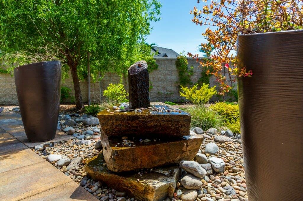 Custom water feature with pondless urn waterfall | Junction City Oregon