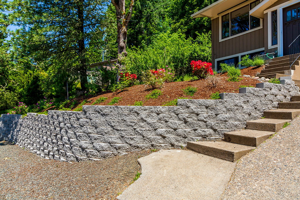 outdoor landscape with retaining wall